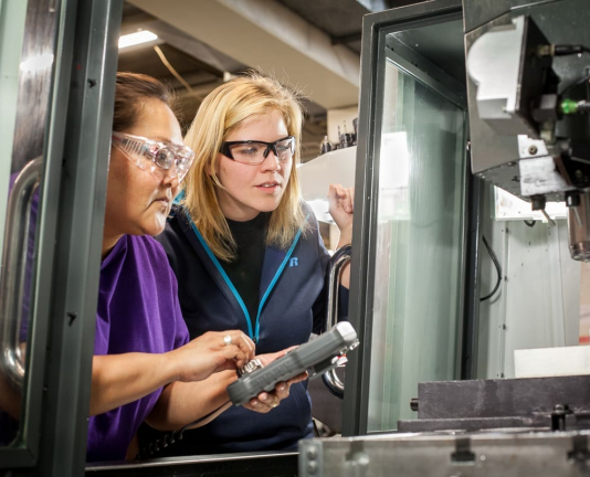 women-working-machinery